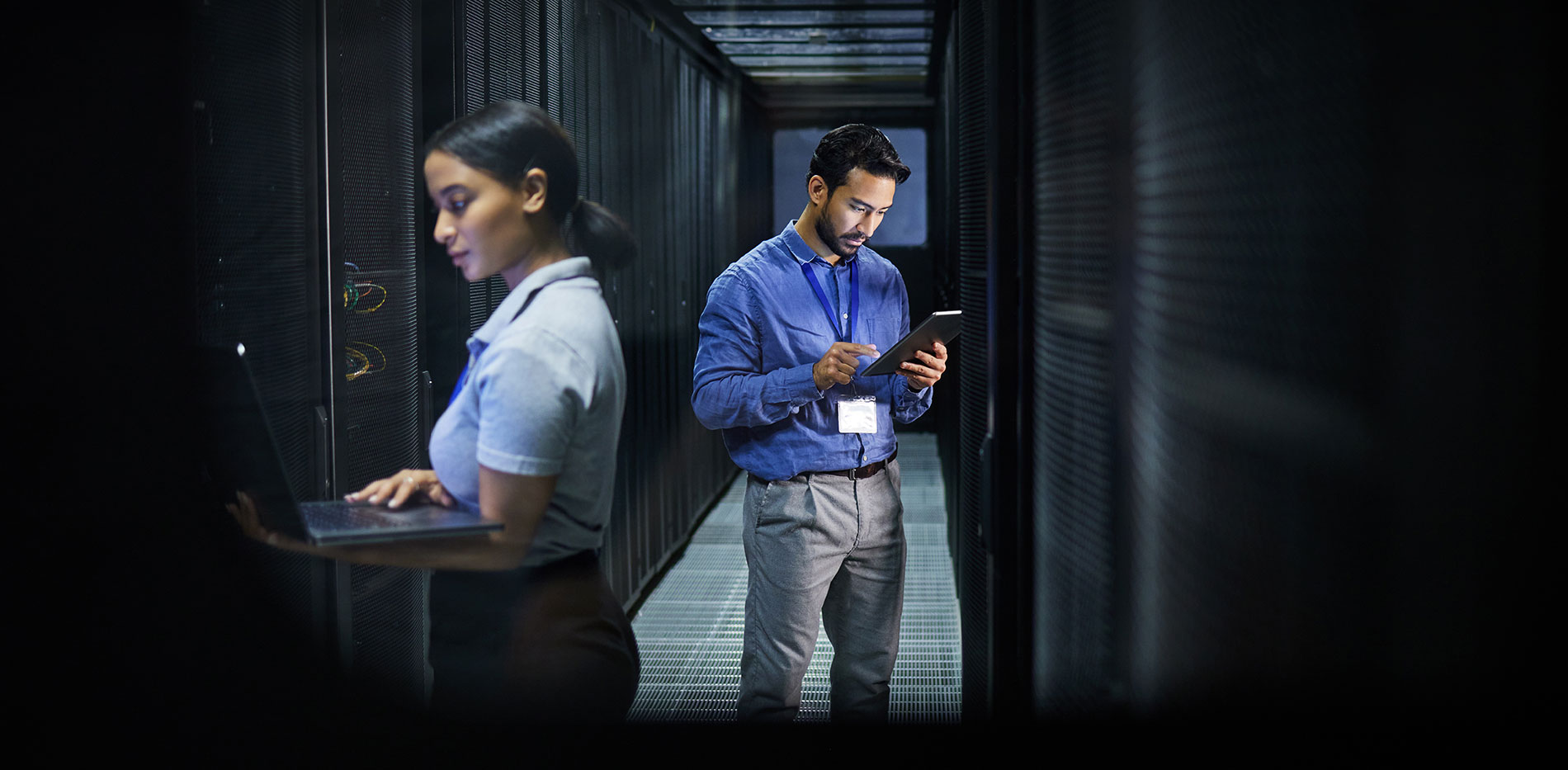 Technology professionals working in a data center